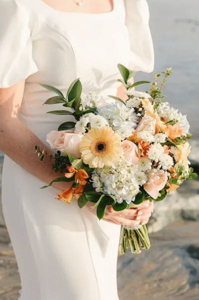 bridal-bouquet-on-beach-texture-and-florals